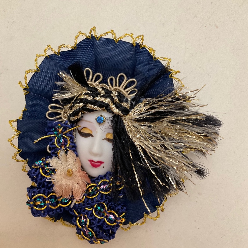 Vintage porcelain face pin, navy ribbon